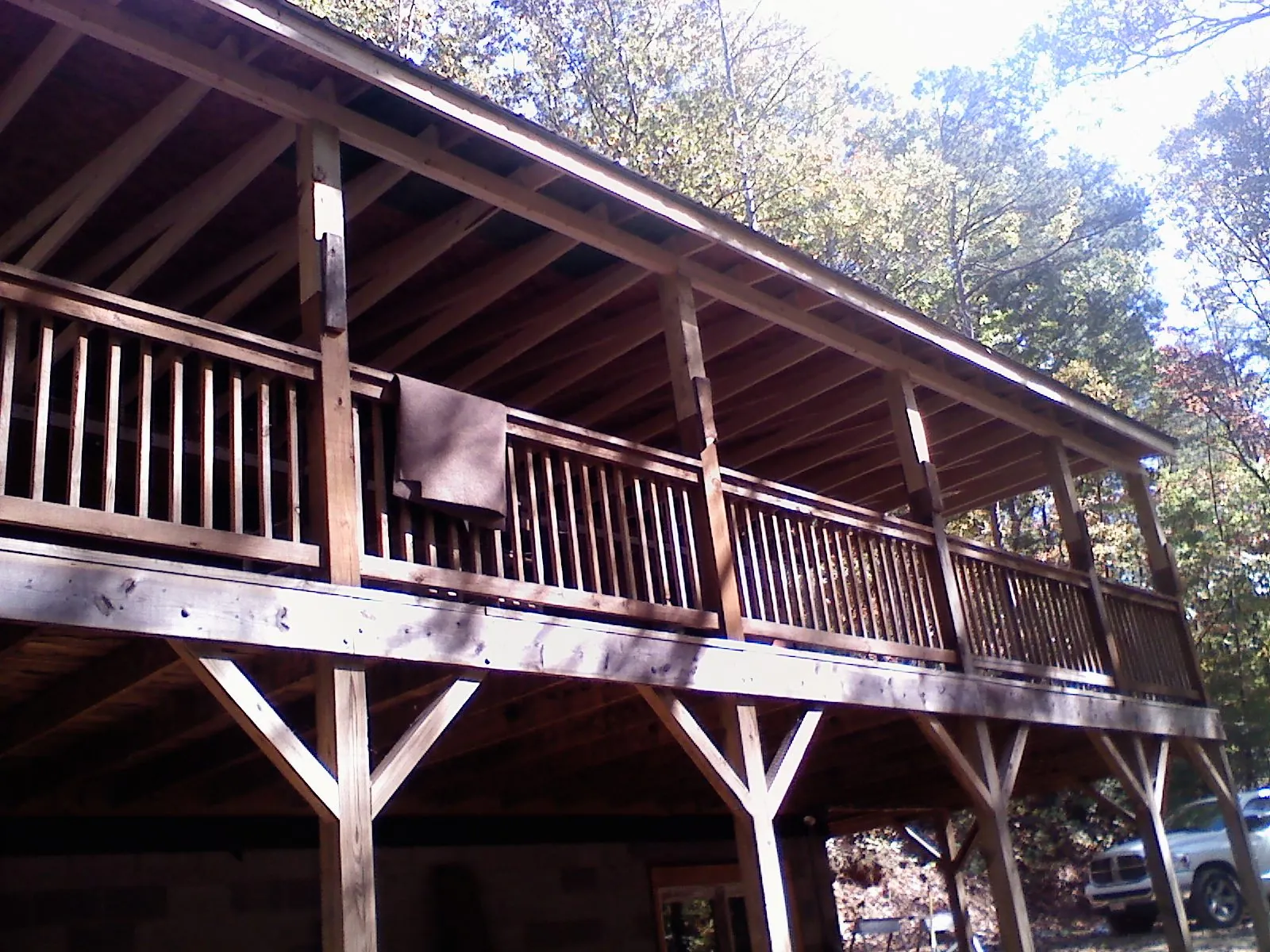 Timber framing under a new elevated porch and deck — Roof Leak Repair in Thomas by Roofing Brothers